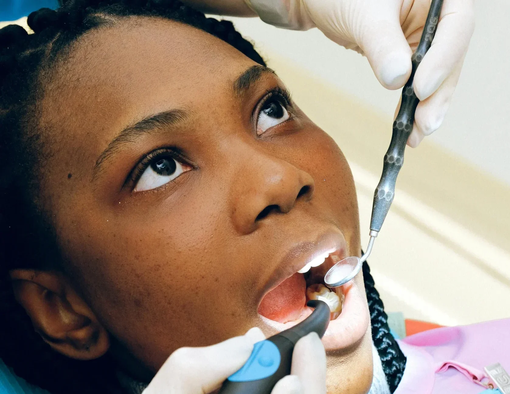 A female patient lying on a dentist bed at Care for You Dental clinic in Las Vegas